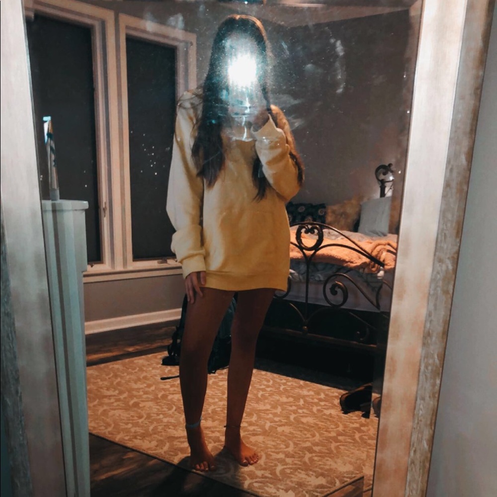 yellow sweatshirt